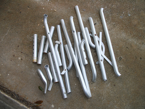 the resulting pile of tube aluminum ready to be scrapped and melted down to ingots or used for a pour.